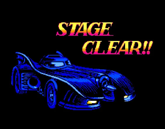 Batmóvel sobre um cenário escuro com a frase "Stage Clear"